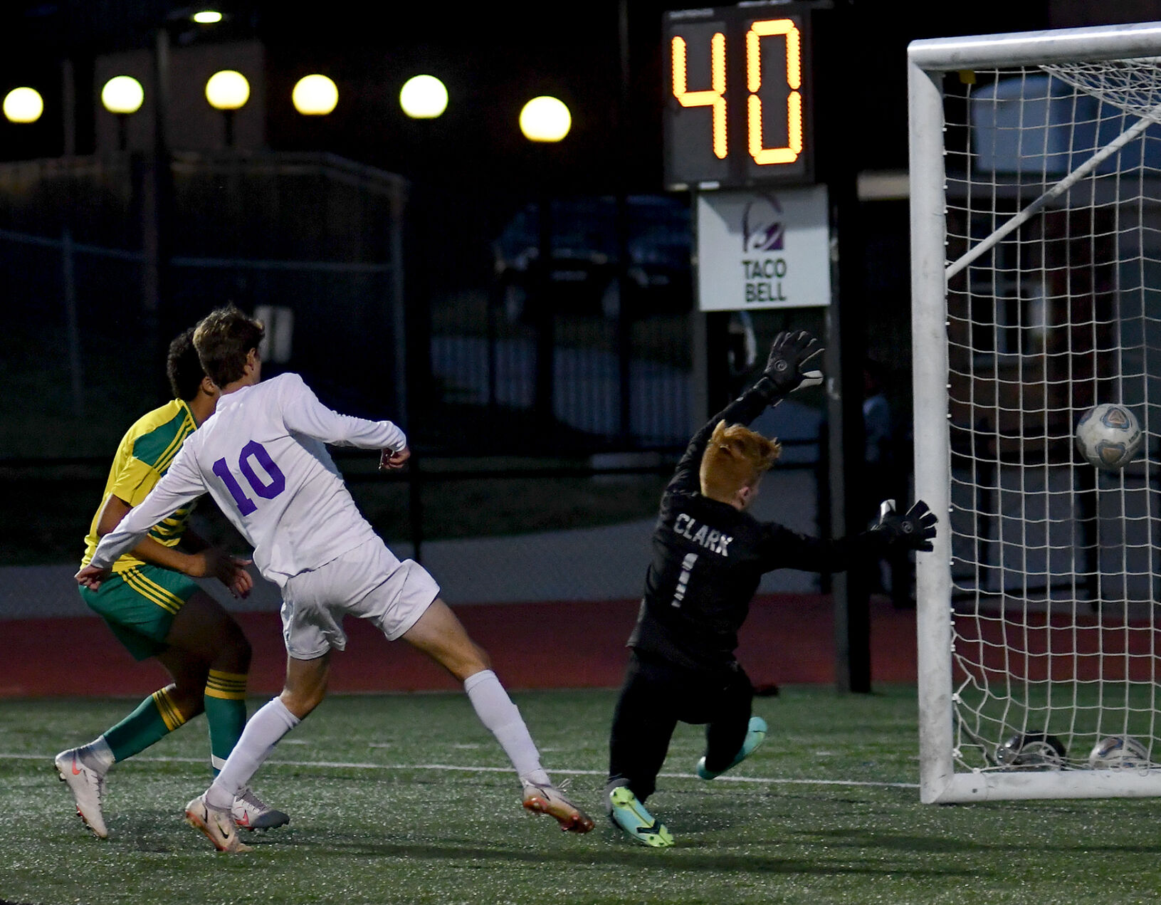 Hickman senior Ilhan Dervisevic scores against Rock Bridge